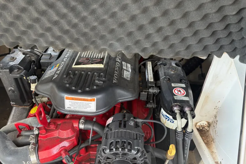 Slide: The Image of Engine compartment of a 2007 Crownline 252 EX boat with Volvo Penta 5.7 engine. - 18