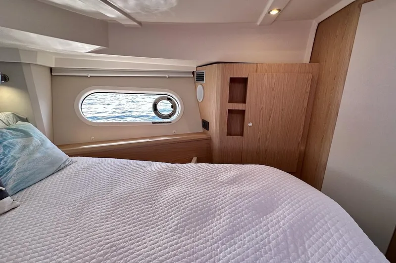 Slide: The Image of Interior cabin of 2024 Beneteau Swift Trawler 41 Sedan with ocean view. - 65