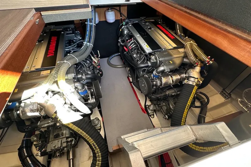 Slide: The Image of Engine room of 2024 Beneteau Swift Trawler 41 Sedan with twin Yanmar engines. - 81
