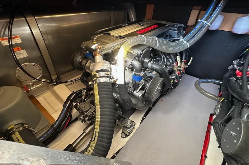 Slide: The Image of Engine room of 2024 Beneteau Swift Trawler 41 Sedan, showcasing detailed mechanical components. - 83