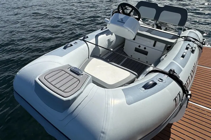 Slide: The Image of Inflatable dinghy docked on water, associated with 2024 Beneteau Swift Trawler 41 Sedan. - 87