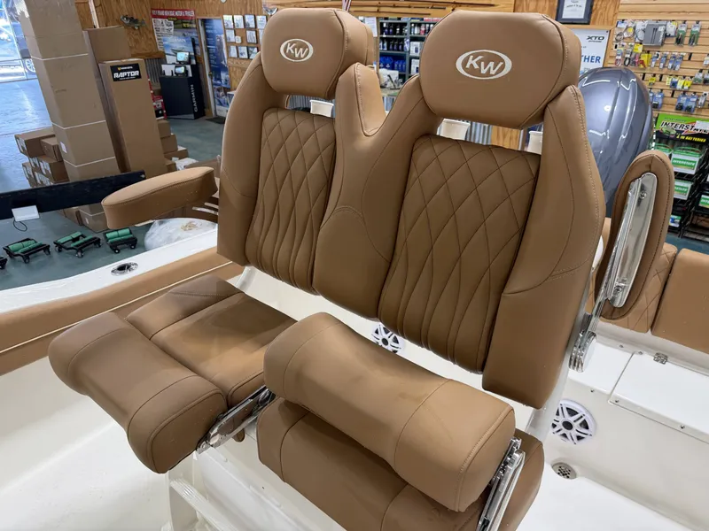 Slide: The Image of Brown leather seats in Key West 219FSR boat, model year 2026. - 14