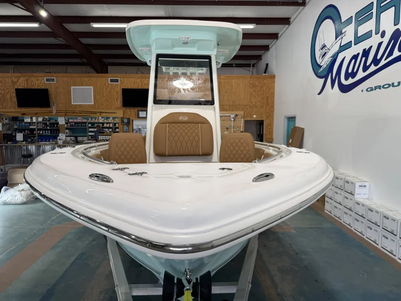 Slide: The Image of Key West 219FSR 2026 boat in showroom. - 5
