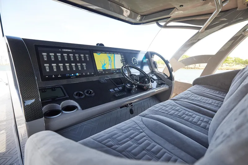 Slide: The Image of Luxurious helm of Midnight Express 52 Vitesse yacht with advanced navigation system. - 15