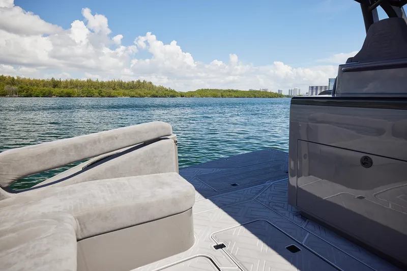 Slide: The Image of Luxury yacht deck view on water, Midnight Express 52 Vitesse, with scenic horizon. - 17