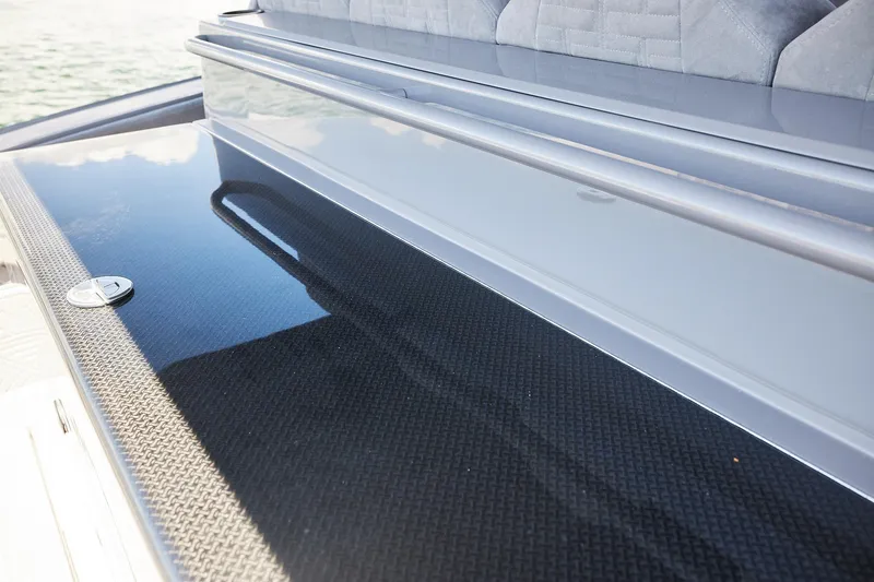 Slide: The Image of Sleek deck of Midnight Express 52 Vitesse boat with carbon fiber finish. - 18