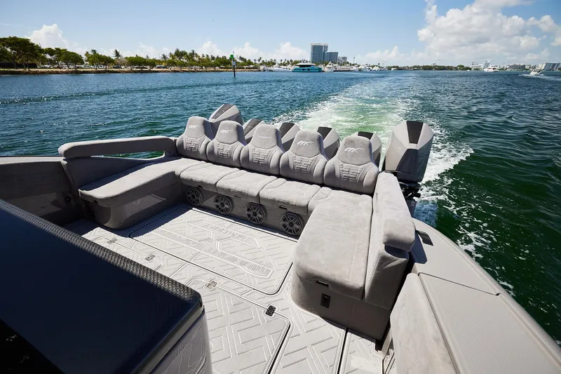 Slide: The Image of Luxurious seating on Midnight Express 52 Vitesse boat cruising on a sunny day. - 20