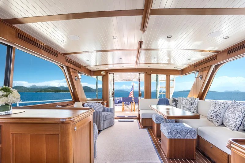 Slide: The Image of Luxurious interior of 2027 Hunt Yachts 63 Flybridge with ocean view and elegant seating. - 1