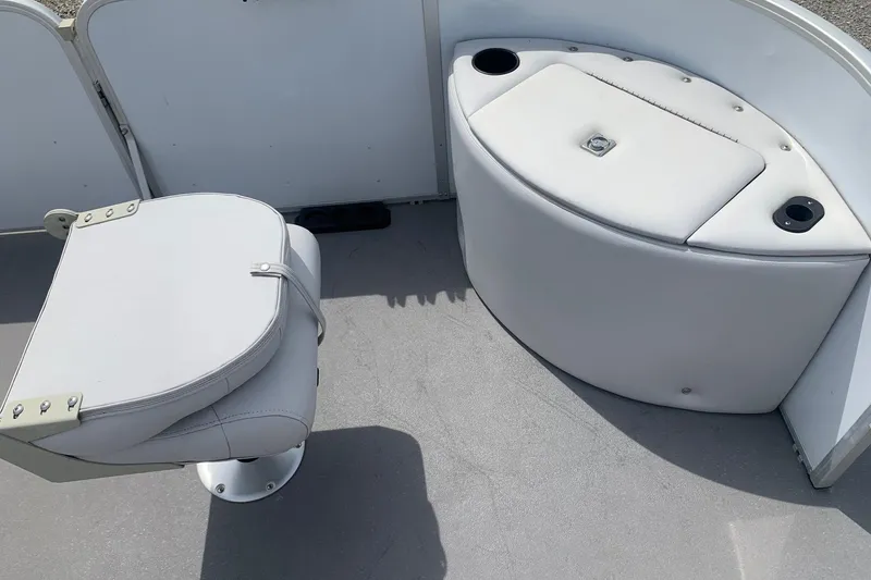 Slide: The Image of Yamaha G3 V22FC 2019 boat interior with white seating and cup holders. - 6