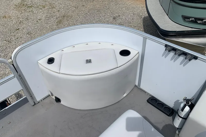Slide: The Image of Yamaha G3 V22FC 2019 boat interior with storage compartment and cup holders. - 7