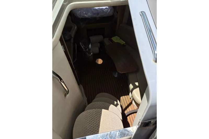 Slide: The Image of Interior view of 2006 Sea Ray Sundancer 320 cabin with seating and table. - 16