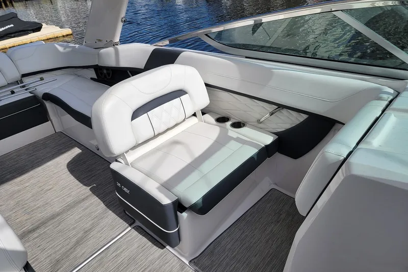 Slide: The Image of Luxurious interior of 2018 Regal 26 OBX boat with comfortable seating and cup holders. - 7
