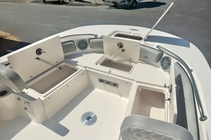 Slide: The Image of 2026 Carolina Skiff 21 Ultra Elite boat interior with open storage compartments. - 13