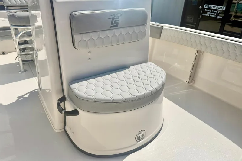 Slide: The Image of 2026 Carolina Skiff 21 Ultra Elite boat seating with hexagonal pattern upholstery. - 18