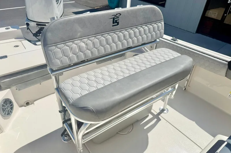 Slide: The Image of 2026 Carolina Skiff 21 Ultra Elite boat seat with hexagonal pattern upholstery. - 21