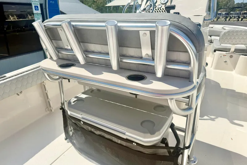 Slide: The Image of 2026 Carolina Skiff 21 Ultra Elite boat interior with rod holders and seating. - 28