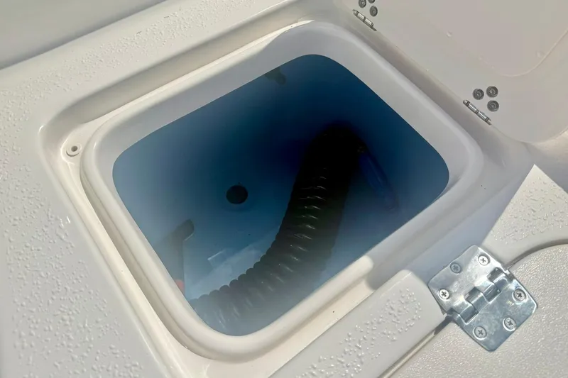 Slide: The Image of Livewell compartment on a 2026 Carolina Skiff 21 Ultra Elite boat. - 34