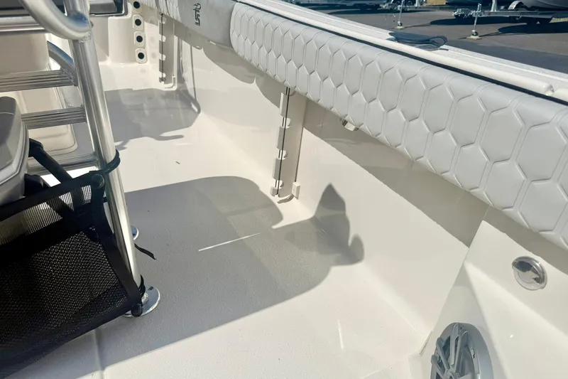 Slide: The Image of 2026 Carolina Skiff 21 Ultra Elite interior with hexagonal upholstery and stainless steel features. - 35