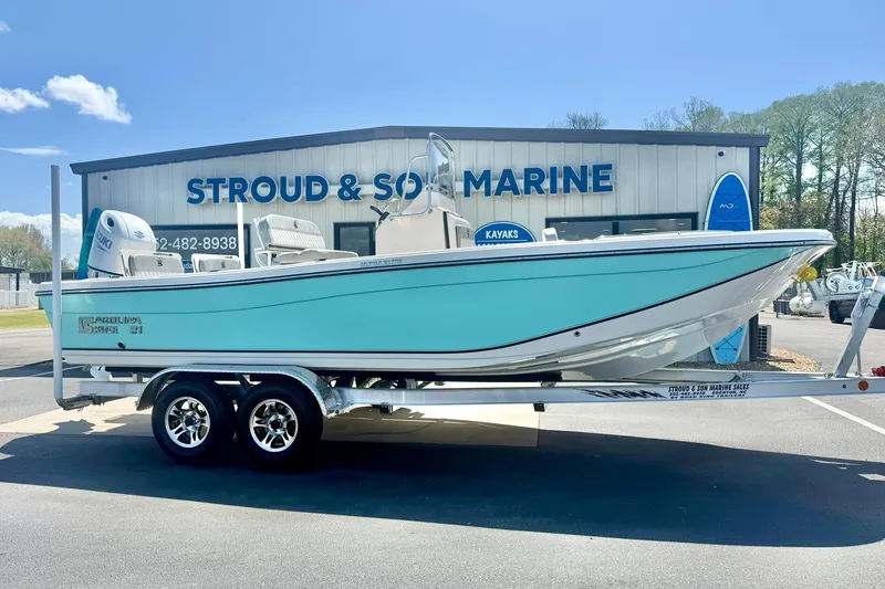 Slide: The Image of 2026 Carolina Skiff 21 Ultra Elite boat on trailer at Stroud & Son Marine. - 6