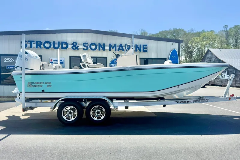 Slide: The Image of 2026 Carolina Skiff 21 Ultra Elite boat on trailer at Stroud & Son Marine. - 7