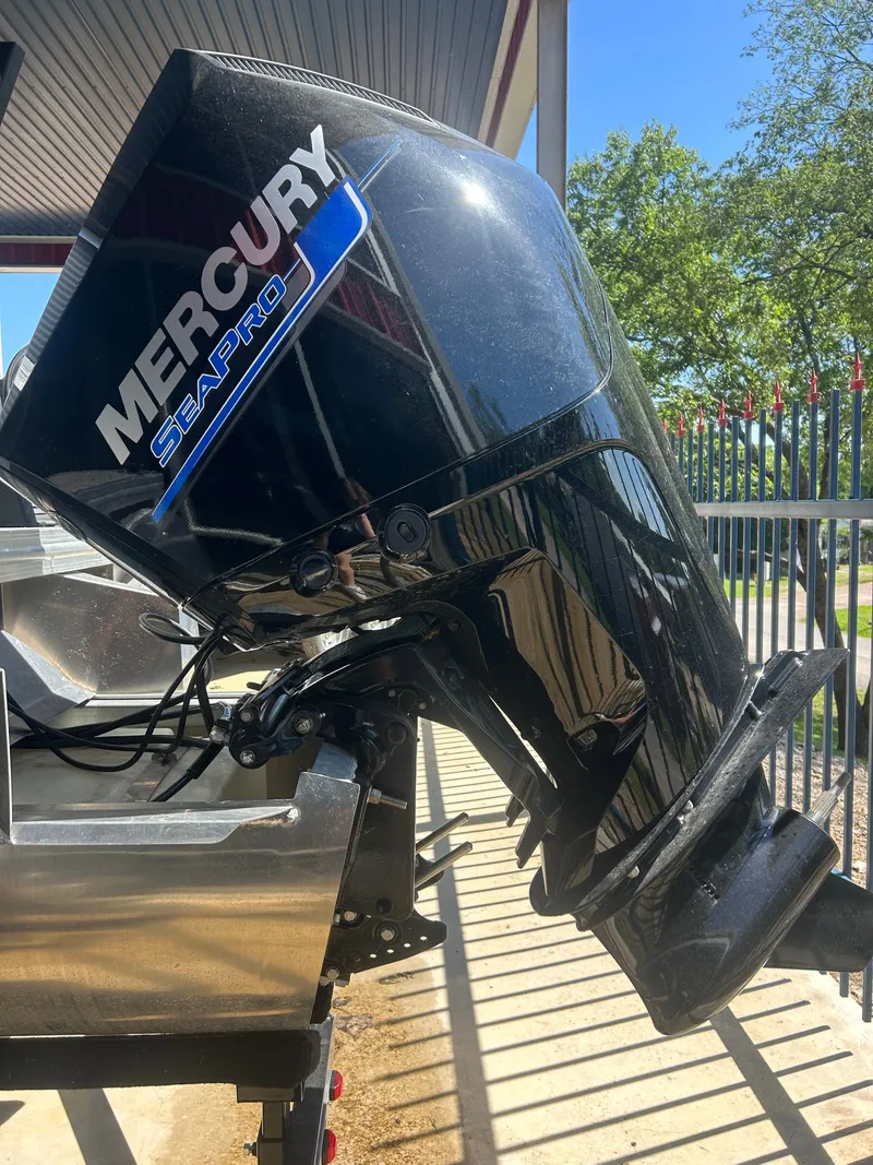 Slide: The Image of Mercury SeaPro outboard motor on Armada Drakkar K248 Tritoon, 2025 model. - 11
