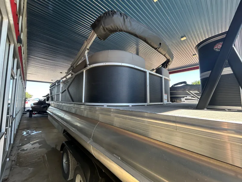 Slide: The Image of 2025 Armada Drakkar K248 Tritoon with 250HP Mercury and tandem axle trailer. - 12