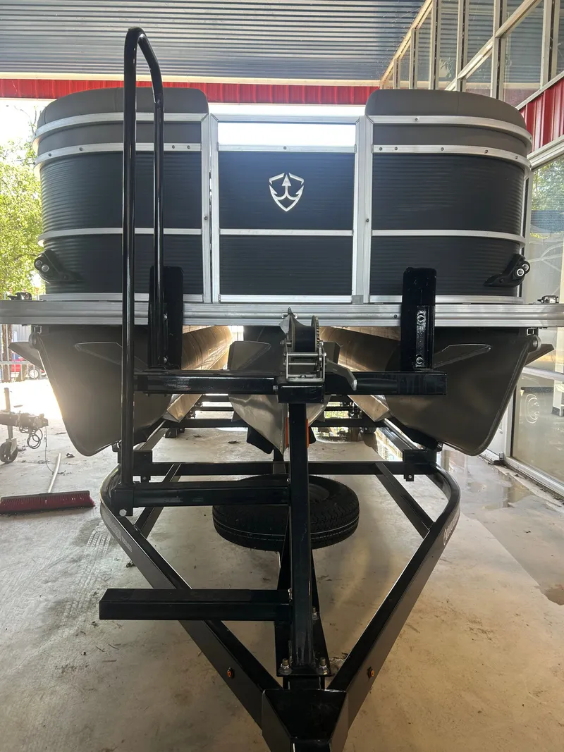 Slide: The Image of 2025 Armada Drakkar K248 Tritoon on tandem axle trailer. - 14