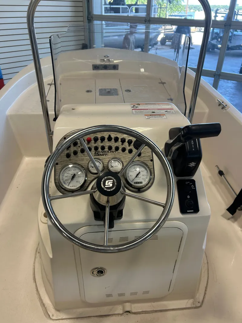 Slide: The Image of Steering console of 2025 Carolina Skiff 178 JLS CC. - 9
