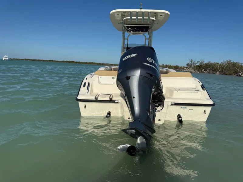 Slide: The Image of 2018 Key West 239 FS boat with Yamaha engine in water. - 3