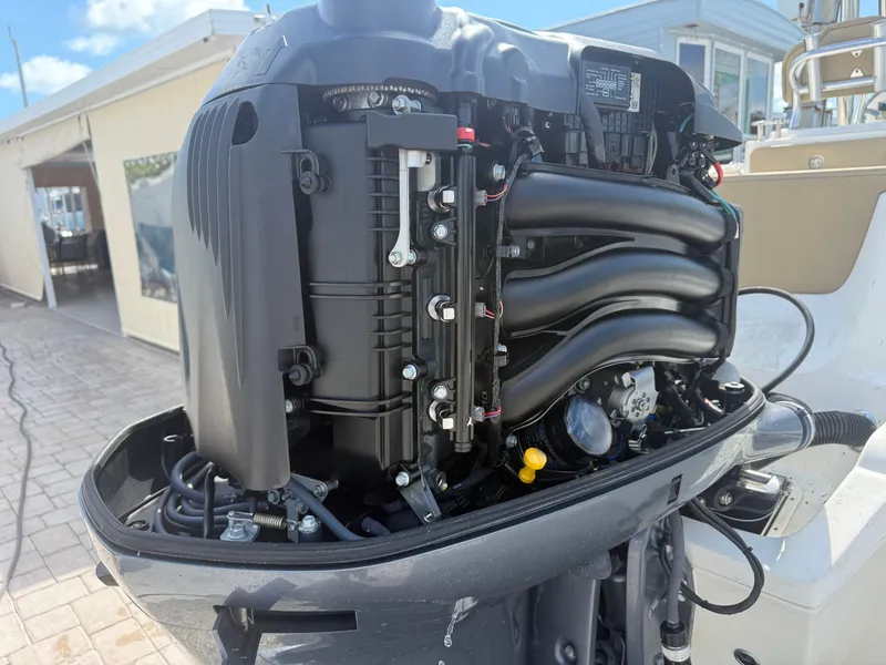Slide: The Image of Outboard motor of a 2018 Key West 239 FS boat. - 7