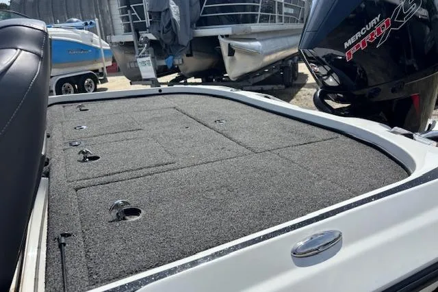 Slide: The Image of 2019 Nitro Z19 boat deck with Mercury Pro XS engine, featuring storage compartments. - 18