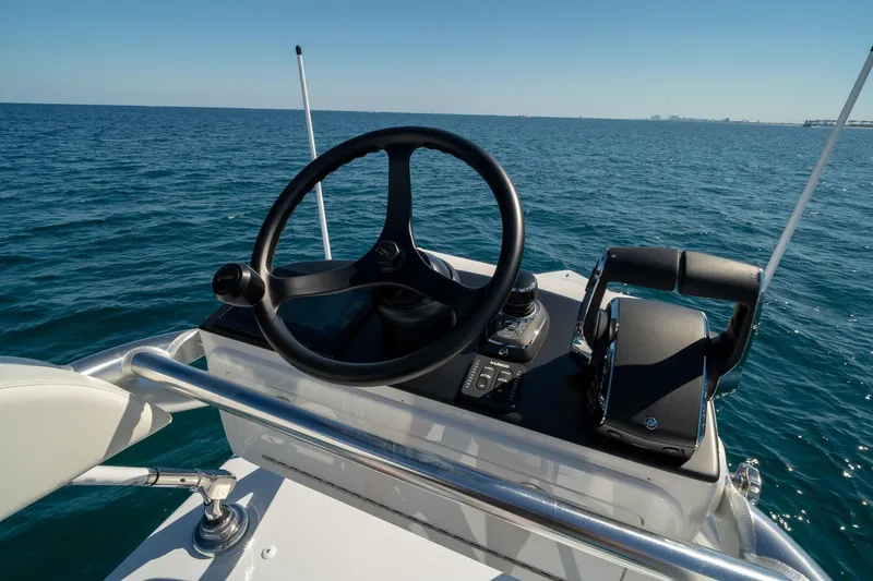 Slide: The Image of Helm of 2026 Conch 33 boat with ocean view and clear sky. - 39