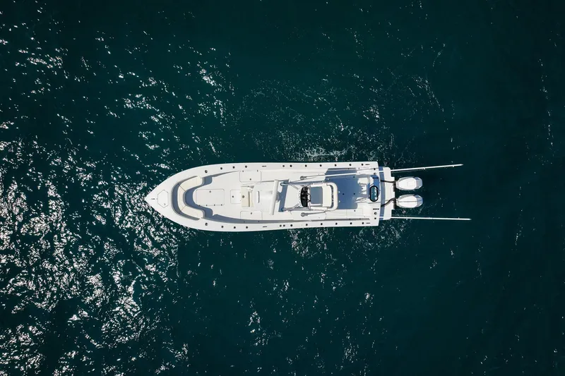 Slide: The Image of Aerial view of 2026 Conch 33 boat on open water. - 8