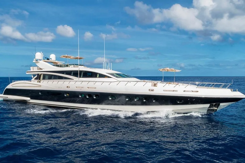 The Image of Luxurious 2012 Italyachts Leopard yacht cruising on open sea under clear blue skies. - 0