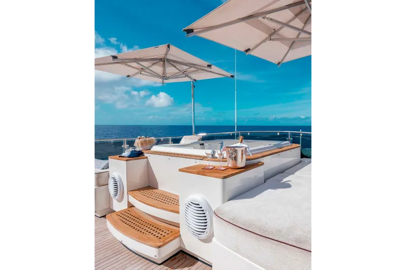 Slide: The Image of Luxurious 2012 Italyachts Leopard yacht deck with sun loungers and ocean view. - 12