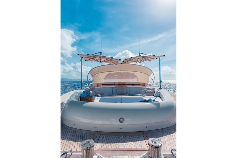 Slide: The Image of Luxurious 2012 Italyachts Leopard yacht deck with seating under sunshade on open sea. - 15