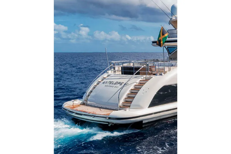 Slide: The Image of Luxury 2012 Italyachts Leopard yacht cruising on open sea with Jamaican flag. - 17