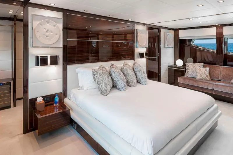 Slide: The Image of Luxurious bedroom interior on 2012 Italyachts Leopard yacht, featuring elegant decor and plush furnishings. - 7
