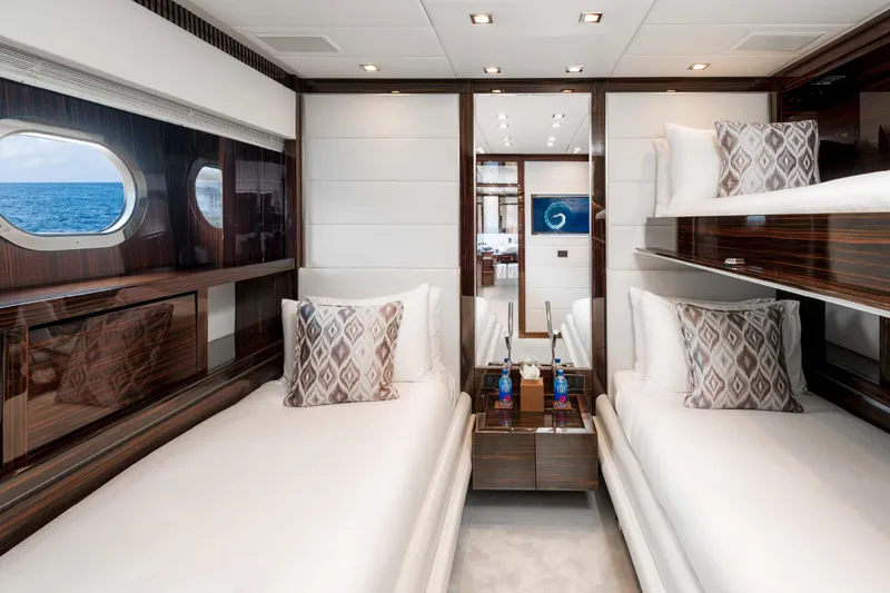 Slide: The Image of Luxurious 2012 Italyachts Leopard yacht cabin with twin beds and ocean view. - 8