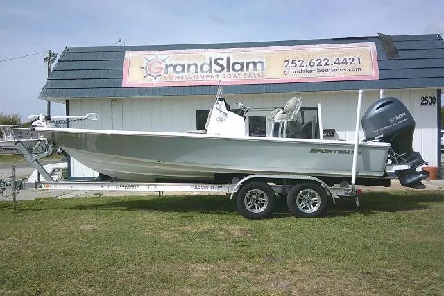 The Image of 2022 Sportsman Tournament 214 Bay Boat on trailer outside Grand Slam Boat Sales. - 0