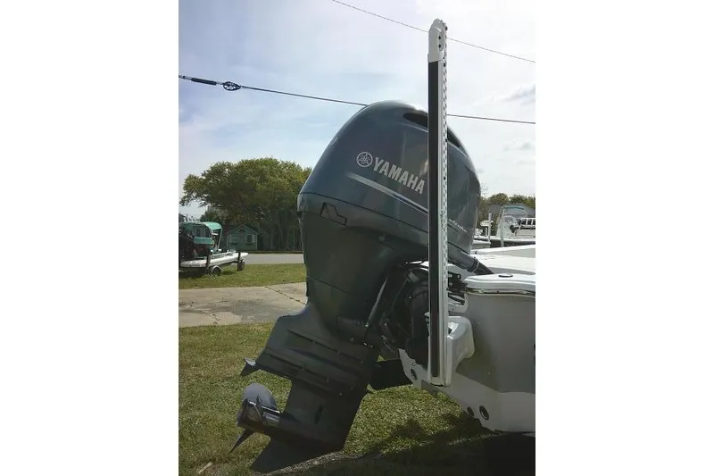 Slide: The Image of 2022 Sportsman Tournament 214 Bay Boat with Yamaha outboard motor. - 14