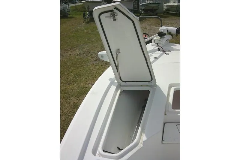 Slide: The Image of Open storage compartment on a 2022 Sportsman Tournament 214 Bay Boat. - 20