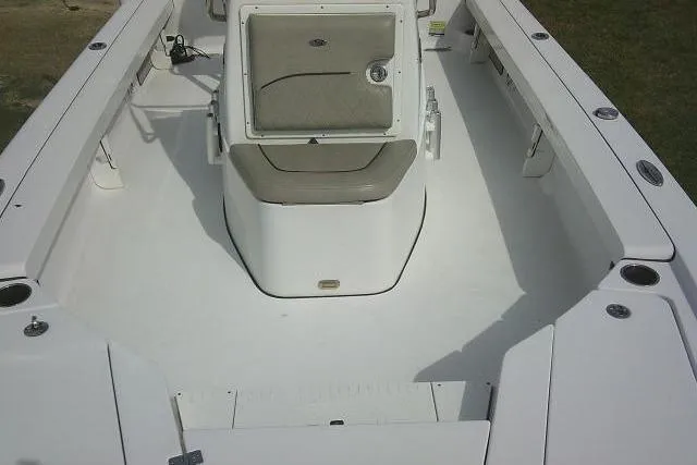 Slide: The Image of 2022 Sportsman Tournament 214 Bay Boat interior with seating and storage compartments. - 23
