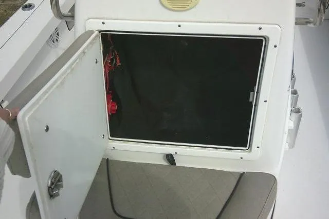 Slide: The Image of Open storage compartment on a 2022 Sportsman Tournament 214 Bay Boat. - 26