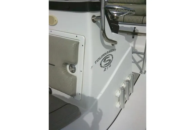 Slide: The Image of 2022 Sportsman Tournament 214 Bay Boat interior with seating and logo detail. - 27