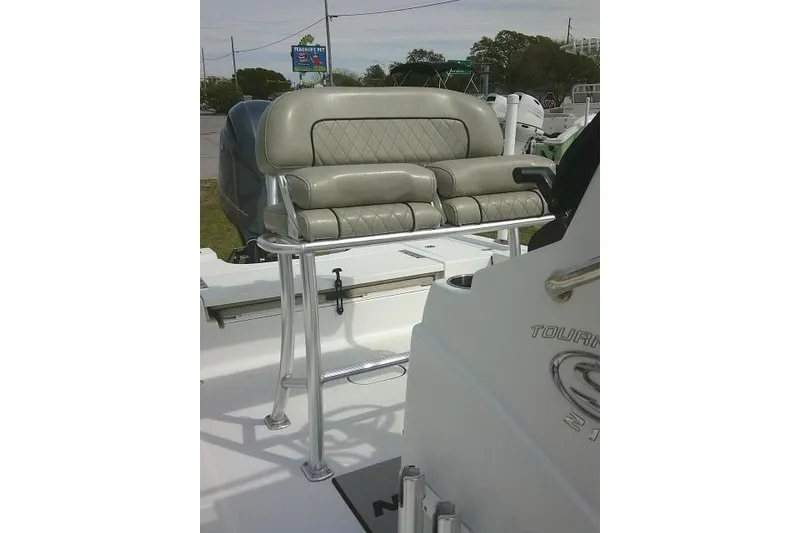 Slide: The Image of 2022 Sportsman Tournament 214 Bay Boat with cushioned seating and sleek design. - 34