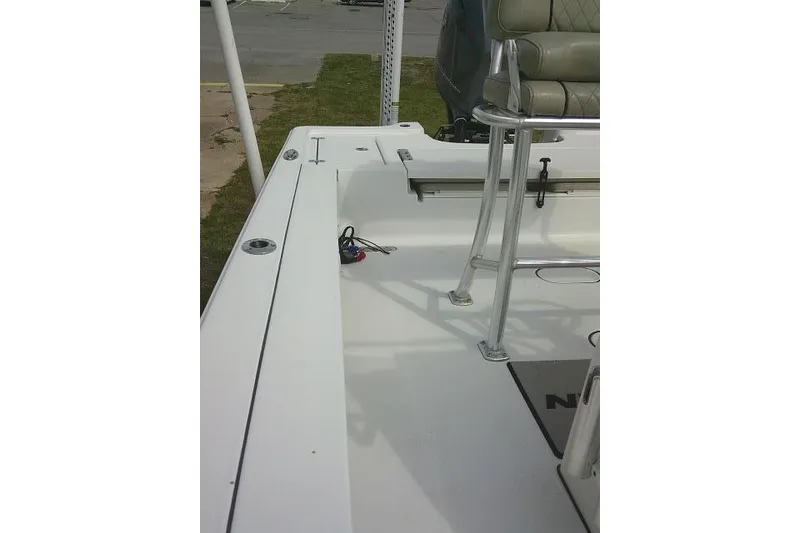 Slide: The Image of 2022 Sportsman Tournament 214 Bay Boat interior with seating and deck view. - 35