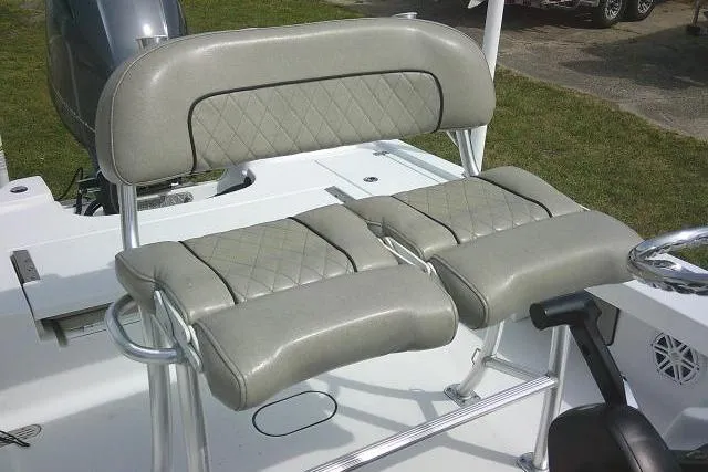 Slide: The Image of 2022 Sportsman Tournament 214 Bay Boat with cushioned seating and sleek design. - 36