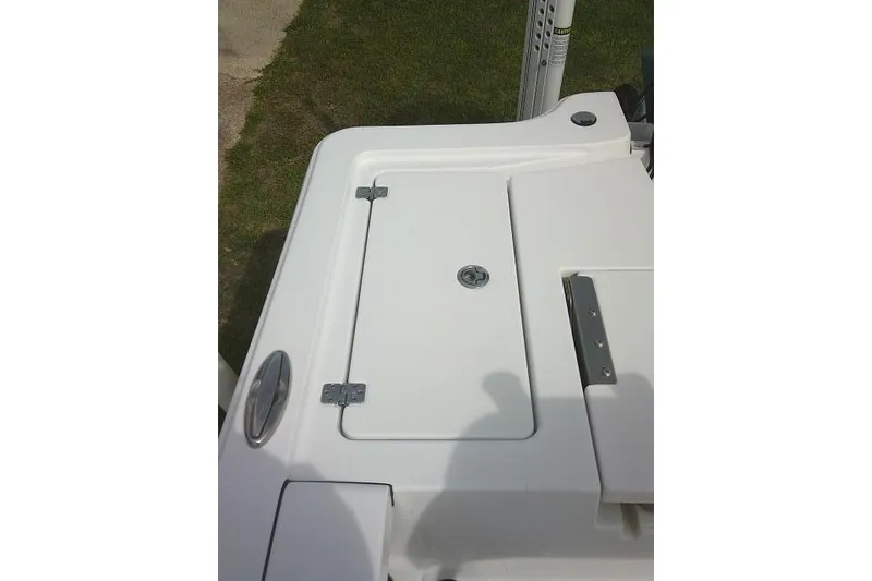 Slide: The Image of 2022 Sportsman Tournament 214 Bay Boat deck with storage compartment. - 37