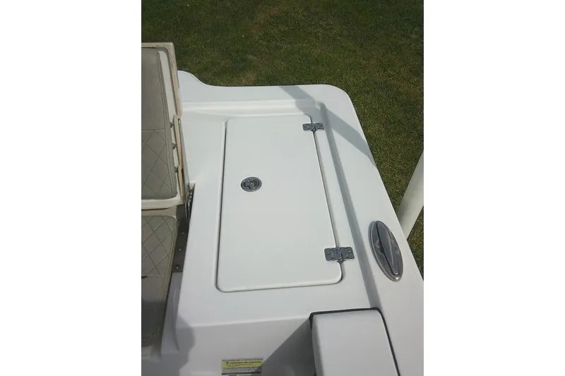 Slide: The Image of 2022 Sportsman Tournament 214 Bay Boat deck with storage compartment. - 43